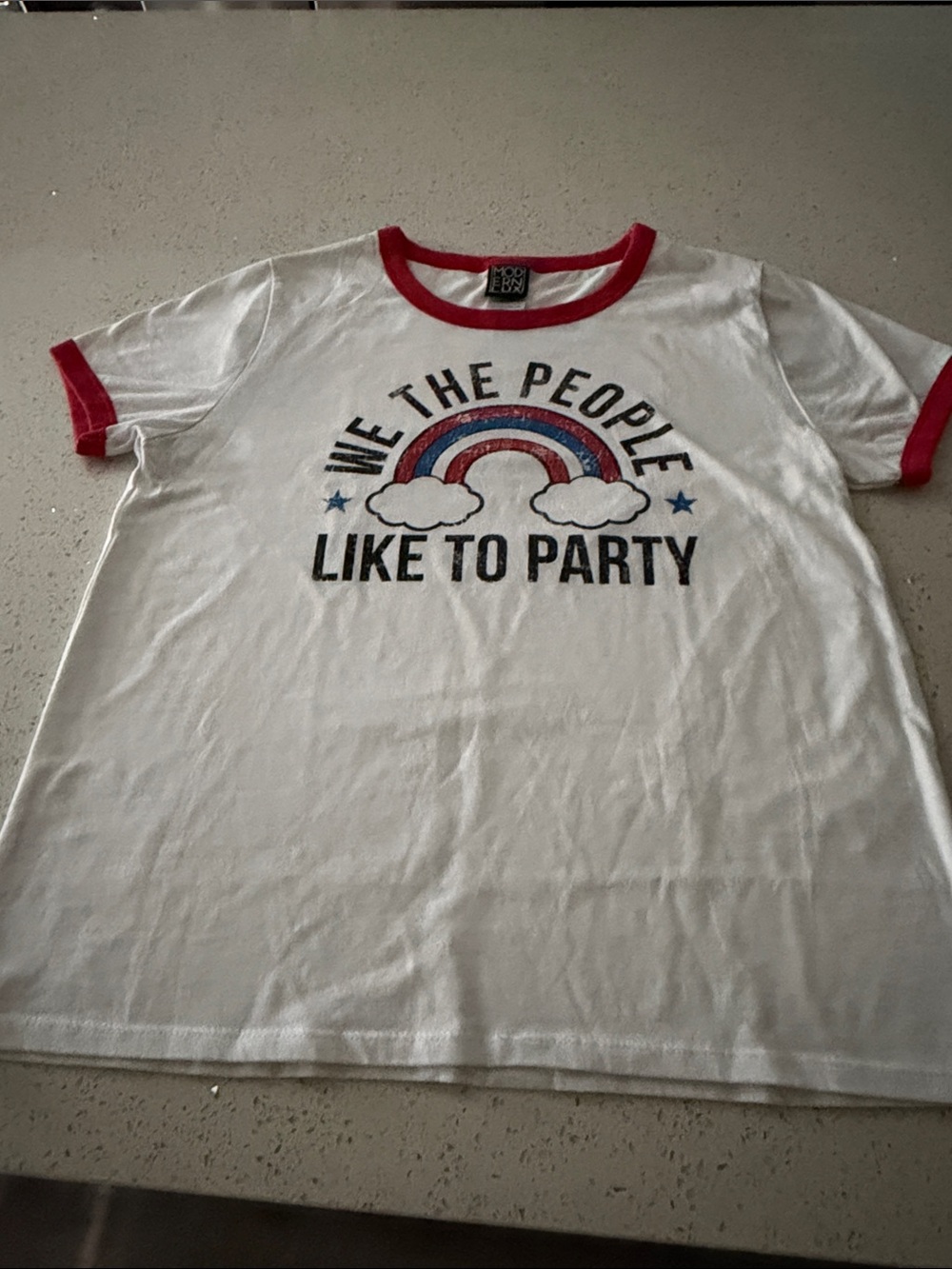 NBW Modern Lux White Tee with Red Trim and Multicolor Rainbow Graphic